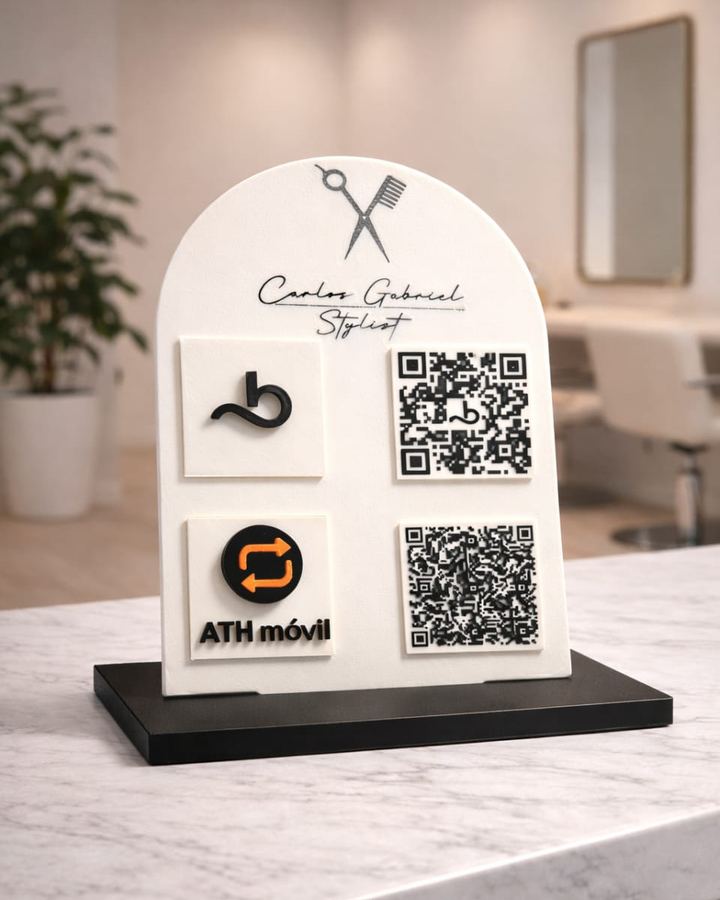 Placa em arco de cabeleireiro, branca e preta, com dois QR Codes e os ícones de cada destino